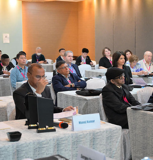 Keynote speaker presenting at the main conference hall